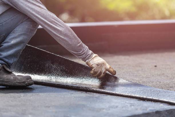 Professional Waterproofing technician working in Idaville, IN
